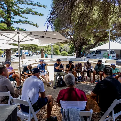 A yarning circle under a tree as part of Cultural Yarns: Djoowak Yarn on Wadjemup.